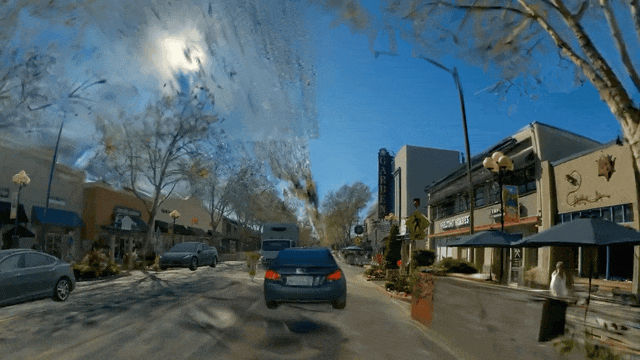 DiffusionHarmonizer: Bridging Neural Reconstruction and Photorealistic Simulation with Online Diffusion Enhancer